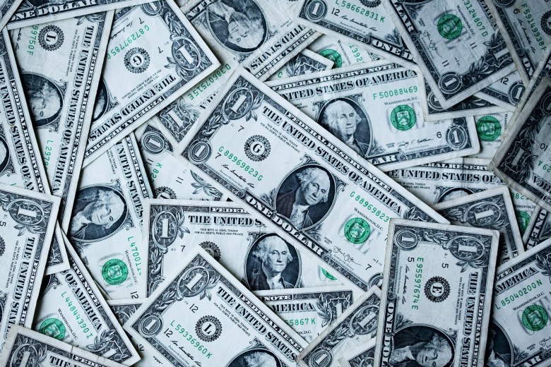 A bunch of one American Dollar bills for TEFL TESOL course payment.